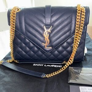 YSL medium diamond quilted envelop bag.